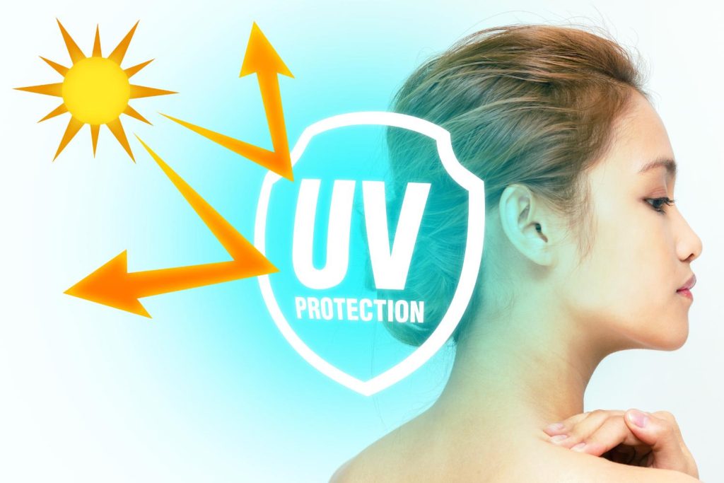 le soleil est renvoyé par la protection uv des cheveux d'une femme